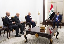 PM, Mohammed Shia al-Sudani (right), delegation from KPMG, a global auditing and financial consulting firm (left)