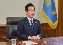 President Lee Jae Myung delivers a New Year's address at Cheong Wa Dae in Seoul on Jan. 1, 2026, in this photo provided by his office. (PHOTO NOT FOR SALE) (Yonhap)