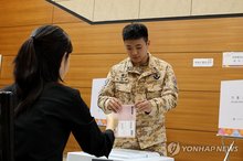 A member of South Korea's Akh unit stationed in the United Arab Emirates casts his ballot ahead of the June 3 presidential election, in this photo provided by the South's Joint Chiefs of Staff on May 23, 2025. (PHOTO NOT FOR SALE) (Yonhap)