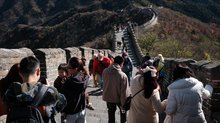 Buzzing with tourists, roof tiles of 650 year old tower collapses in eastern China
