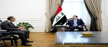 PM, Mohammed Shia al-Sudani (right), British Ambassador to Iraq Irfan Siddiq (left) 