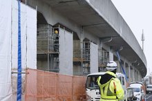 A quake-damaged elevated railway of JR Hachinohe Line in Hachinohe, Aomori Prefecture, is under repair on Dec. 15, 2025. (Kyodo)