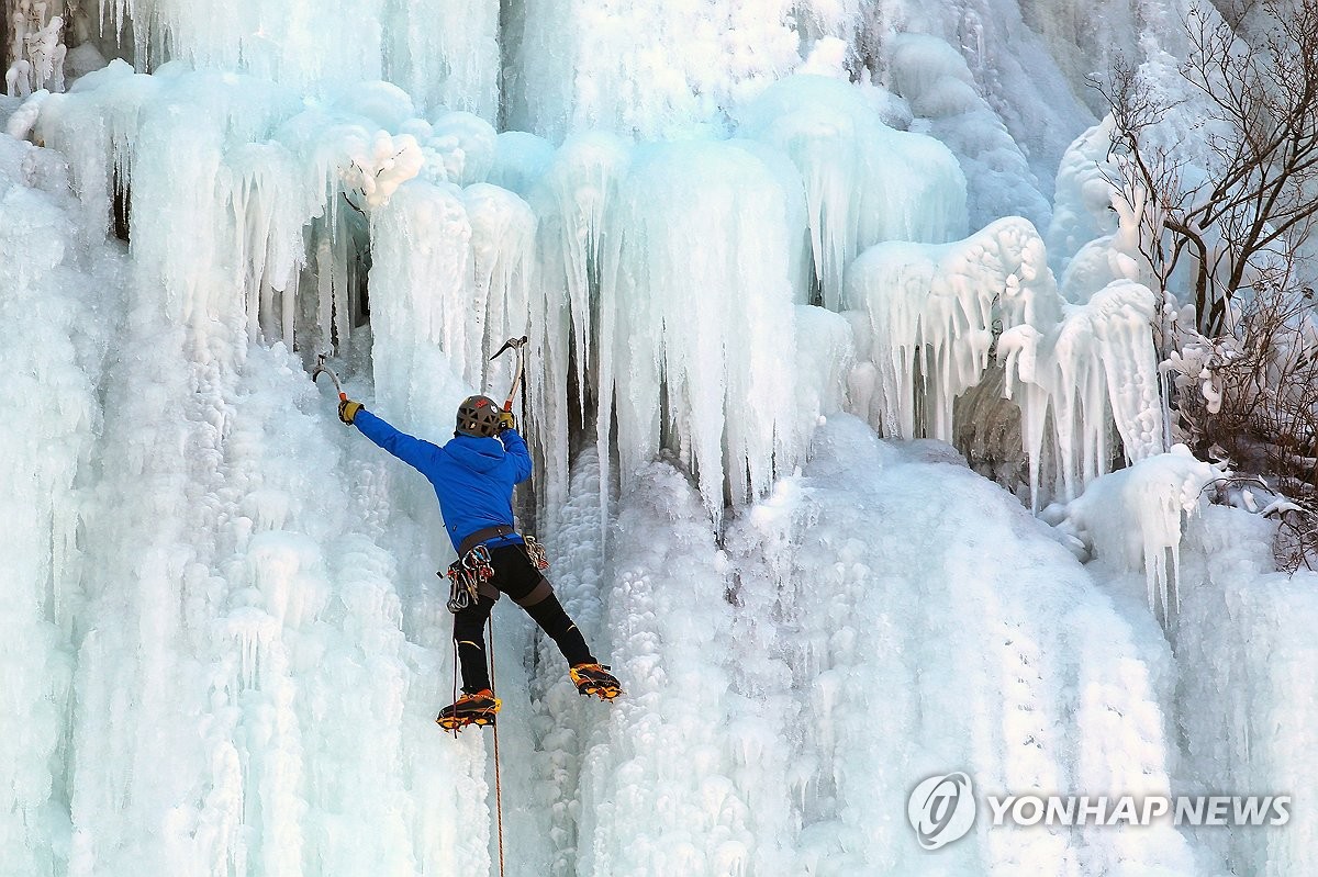 Climbing icy wall