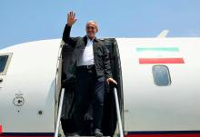 Iran president starts his 1st foreign visit from neighboring Iraq