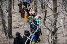 Rohingya refugees walk after landing on the shores of Gampong Baro, Baitussalam sub-district, Aceh Besar, Aceh, on January 8, 2023. (ANTARA PHOTOS/Khalis Surry/my)