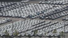 This file photo taken Sept. 16, 2022, shows a batch of vehicles to be exported from a port of Hyundai Motor Co.'s factory in the southeastern city of Ulsan.