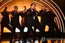 BTS member Jungkook (C) is seen performing "Standing Next to You" in this photo provided by NBC. (PHOTO NOT FOR SALE) (Yonhap)