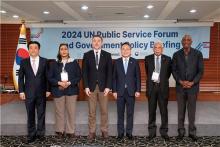 Vice Interior Minister Ko Ki-dong (3rd from R); Park Yung-suh, the head of the U.N. Public Service Forum task force (L); and ambassadors stationed in South Korea pose for a photo during a policy briefing at the press center in Jung Ward on May 24, 2024, in this photo provided by the Ministry of the Interior and Safety. (PHOTO NOT FOR SALE) (Yonhap)