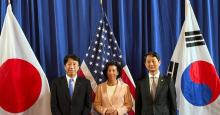 South Korean Industry Minister Ahn Duk-geun (R), U.S. Commerce Secretary Gina Raimondo (C) and Japanese Industry Minister Ken Saito pose for a photo before the three countries' inaugural commerce-industry ministerial meeting in Washington on June 26, 2024. (Pool photo) (Yonhap)