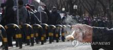 This file photo taken Dec. 19, 2023, shows a line at a soup kitchen in Daegu, some 235 kilometers south of Seoul. (Yonhap)