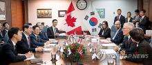 Defense Minister Kim Yong-hyun (2nd from L) attends a bilateral meeting with his Canadian counterpart, Bill Blair, held in Ottawa on Nov. 1, 2024, in this photo provided by Seoul's defense ministry. (PHOTO NOT FOR SALE) (Yonhap)