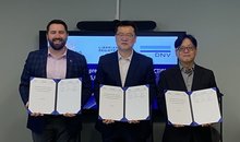 This undated photo provided by Hanwha Ocean Co. shows officials from Norway's DNV and Hanwha Ocean posing for a photo after signing a memorandum of understanding (MOU) during the Nor-Shipping 2025 conference in Oslo, Norway. (PHOTO NOT FOR SALE) (Yonhap)
