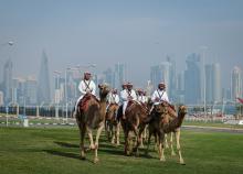 DOHA, Jan 27 (Bernama) -- A group of guards riding camels in front of the Amiri Diwan, the centre of Qatar's government, also known as the royal palace of Qatar.