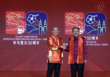 KUALA LUMPUR, Feb 2 -- Malaysian Deputy Prime Minister Fadillah Yusof and Chinese Ambassador to Malaysia Ouyang Yujing during the 2024 Chinese New Year Reception at Shangri-La Hotel here Friday.