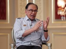 PUTRAJAYA, May 1 -- Malaysian Prime Minister Anwar Ibrahim answering questions during the "Soal Jawab Perdana Menteri" programme at Seri Perdana today.  --fotoBERNAMA (2024) COPYRIGHT RESERVED
