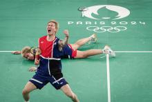 Malaysia's mixed doubles pair Chen Tang Jie-Toh Ee Wei react after defeating China’s world number two pair Feng Yan Zhe-Huang Dong Ping 17-21, 21-15, 21-16 in a thrilling three-set encounter that lasted for more than an hour on Monday.