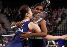 Malaysian badminton pair Pearly Tan and Thinaah Muralitharan advanced to the quarter-finals of the 2024 Paris Olympics.