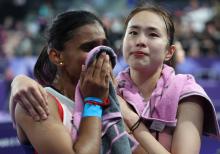 Malaysia's women's doubles Pearly Tan and Thinaah Muralitharan