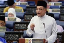 Prime Minister Datuk Seri Anwar Ibrahim who also Finance Minister tabling the Supply (Budget) Bill 2025 in the Dewan Rakyat, Friday.  The 2025 Budget, themed "Membugar Ekonomi, Menjana Perubahan, Mensejahtera Rakyat” is the third budget tabled by the Anwar-led MADANI Government and the last under the 12th Malaysia Plan (2021-2025) before the transition to the 13th Malaysia Plan for the next five years.