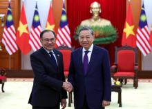 VIETNAM, Feb 25 -- Prime Minister Datuk Seri Anwar Ibrahim (left) paid a courtesy call to the General Secretary of the Communist Party of Vietnam, To Lam held at the Headquarters of the Communist Party of Vietnam today.  -- fotoBERNAMA (2025) COPYRIGHT RESERVED