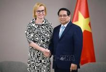 Prime Minister Pham Minh Chinh (R) and Chairwoman of the Communist Party of Bohemia and Moravia (KSCM) Katerina Konecna at their meeting in Prague on January 18. (Photo: VNA)