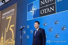 South Korean President Yoon Suk Yeol speaks as he arrived at the Walter E. Washington Convention Center in Washington on July 11, 2024 to attend a NATO summit. (Pool photo) (Yonhap)