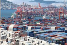 Containers await shipment overseas at a port in the southeastern city of Busan on June 30, 2025. (Yonhap)