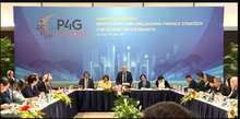 At the discussion on "Revitalising and Unleasing Finance Strategy for Global Green Growth". (Photo: VNA)