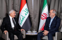 Iranian President Masoud Pezeshkian, (right), Iraqi President Abdul Latif Jamal Rashid ( left)