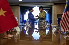 Deputy Prime Minister Dr Ahmad Zahid Hamidi receives a visit from Vietnamese Deputy Prime Minister Tran Hong Ha at a hotel Friday, after attending the 46th General Assembly of the ASEAN Inter-Parliamentary Assembly (AIPA-46)