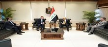 The Minister of Construction, Housing, and Municipalities, Benkin Rekani, (right) the Finnish Ambassador to Iraq, Antti Potkonen (left)