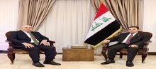 Iraqi National Security Advisor Qasim al-Araji (right), the Hungarian Ambassador to Iraq, Osama al-Nafaa, (left)