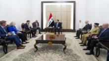 PM, Mohammed Shiaa al-Sudani (center) a member of the Armed Forces Committee in the US House of Representatives, Seth Moulton, and the US Ambassador to America, Alina L. Romanowski (left)