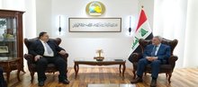 Undersecretary of the Foreign Ministry for Bilateral Relations Mohammed Hussein Mohammed Bahr Al-Uloom (right), the Ambassador of the Republic of Tunisia to Iraq Chokri Latif (left)