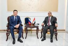 Minister of Electricity Ziad Ali Fadhil (right), Russian Deputy Prime Minister Alexander Novak (left) 