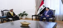 PM, Mohammed Shia Al-Sudani (right), the Special Representative of the Secretary-General of the United Nations in Iraq, Mohammed Al-Hassan (left)