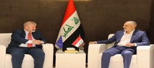 Babylon Governor Adnan Al-Faihan, (right), EU Ambassador to Iraq, Thomas Seiler (left)