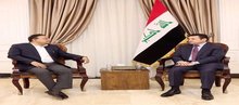Iraq's National Security Advisor, Qasim Al-Araji (right), the Indian Ambassador to Iraq, Sumn Bagchi ( left)