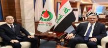 Deputy PM for Energy Affairs, Oil Minister, Hayan Abdul-Ghani Al-Sawad (right), the South Korean Ambassador to Baghdad, Lee Joon-Il (left)