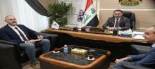 Director General of the Iraqi State Company for Exhibitions and Commercial Services, Mustafa Al-Ani (centre), the representative of the Turkish Embassy in Iraq, Commercial Counselor Fatih Celenk (left)