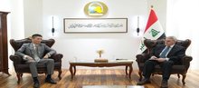 Iraq’s Deputy Foreign Minister for Bilateral Relations, Mohammed Hussein Bahr Al-Uloom (right), he Chinese Ambassador in Baghdad, Cui Wei, (left) 