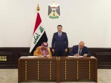 PM, Mohammed Shia Al-Sudani (centre), minister of Culture (right), head of the Arab Tourism Organization affiliated with the League of Arab States, Bandar bin Fahd Al-Fahid (left)