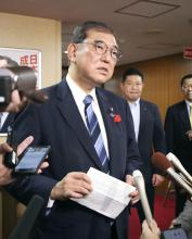 Japanese Prime Minister Shigeru Ishiba speaks to reporters in Tokyo on Oct. 6, 2024, following the announcement that his ruling Liberal Democratic Party will not endorse some party lawmakers implicated in a slush funds scandal as its official candidates in the upcoming general election amid fallout from the scandal that has eroded voter trust. (Kyodo)