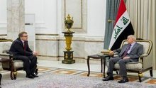 President Abdul Latif Jamal Rashid (right), the Turkish Ambassador to Iraq, Anil Bora Inan (left)