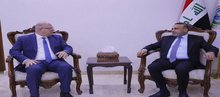 Iraqi Minister of Labor and Social Affairs, Ahmed Al-Asadi (right), his Lebanese counterpart, Mohammad Haidar (left)