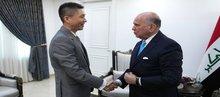  Iraqi FM, Fuad Hussein (right), the Ambassador of the People’s Republic of China to Iraq, Cui Wei (left)