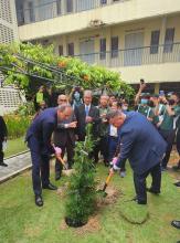 Poland's Ambassador to Malaysia Krzysztof Dobrowolski and Ukraine's Chargé d’Affaires Denys Mykhailiuk planting a tree at the International Day of Peace celebrations in Taiping, Malaysia on Sept 23, 2023.