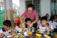 Lunch for children at Thien An school (Photo: VNA)