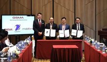 Representatives of MobiFone, Viettel, and VNPT at the signing ceremony of a memorandum of understanding on their cooperation under the GSMA Open Gateway initiative. (Photo: laodong.vn)