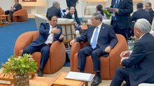 Prime Minister Pham Minh Chinh (L) meets with Chinese Premier Li Qiang on the sidelines of the expanded BRICS summit in Rio de Janeiro, Brazil on July 7 (Photo: VNA)